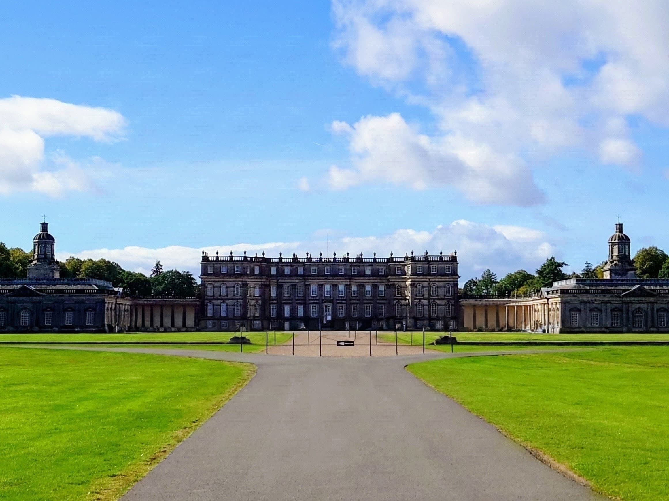 The grand classical frontage and sweeping colonnades of Hopetoun House.