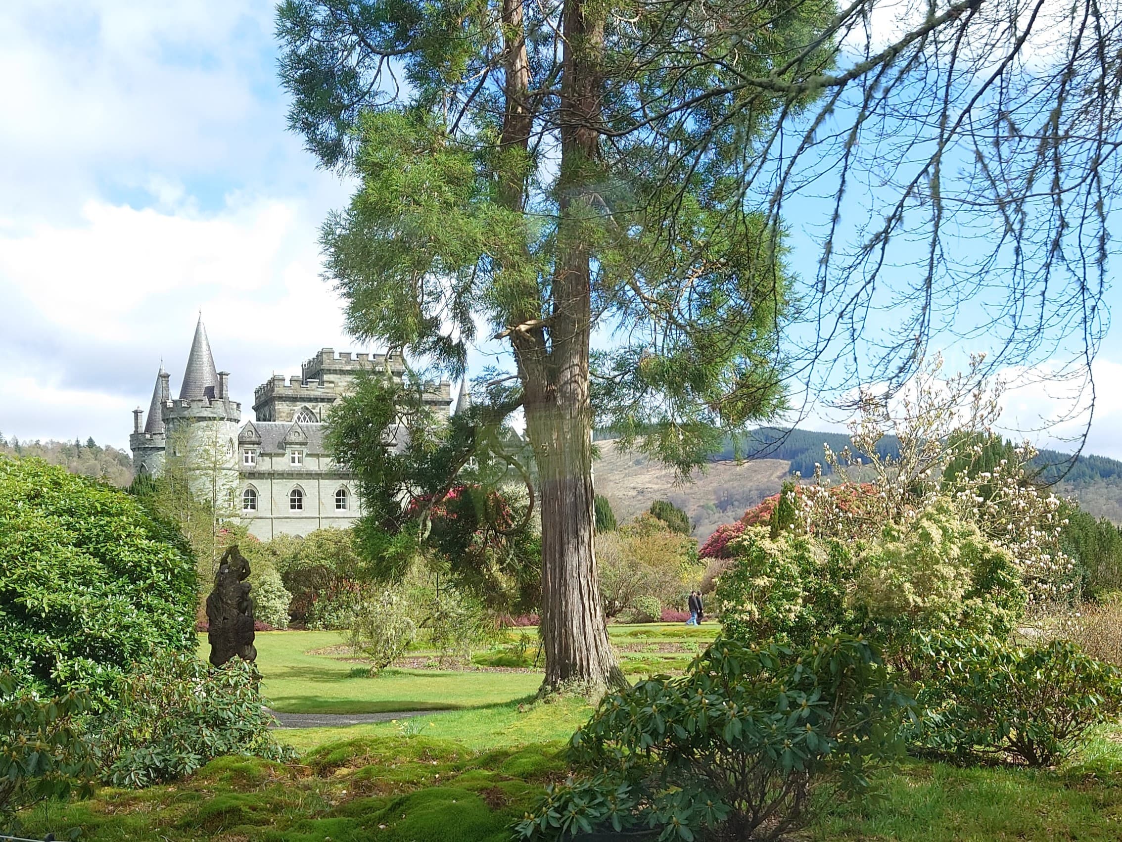 Inveraray Castle neo-Gothic towers and wooded estate grounds near Loch Fyne.