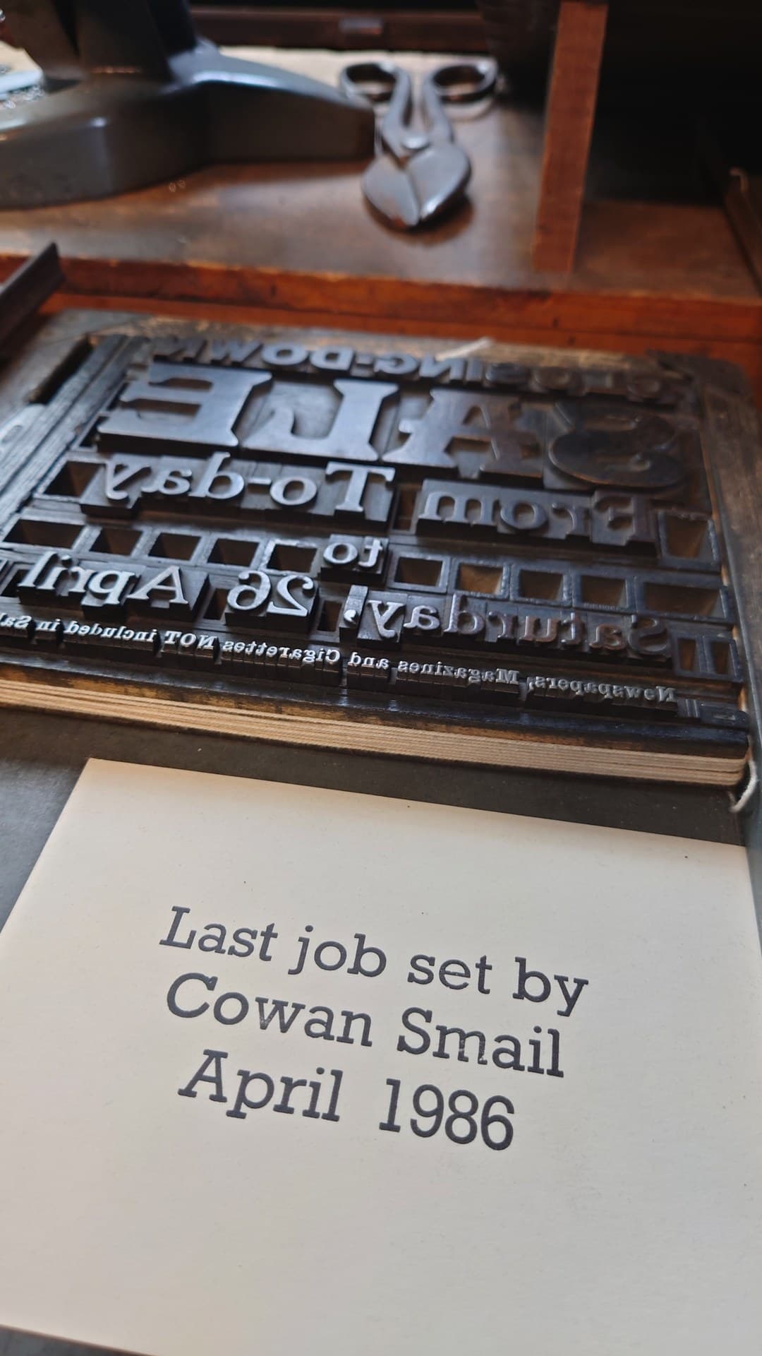 Close-up of hand-set metal type and composing stick in the Borders print workshop