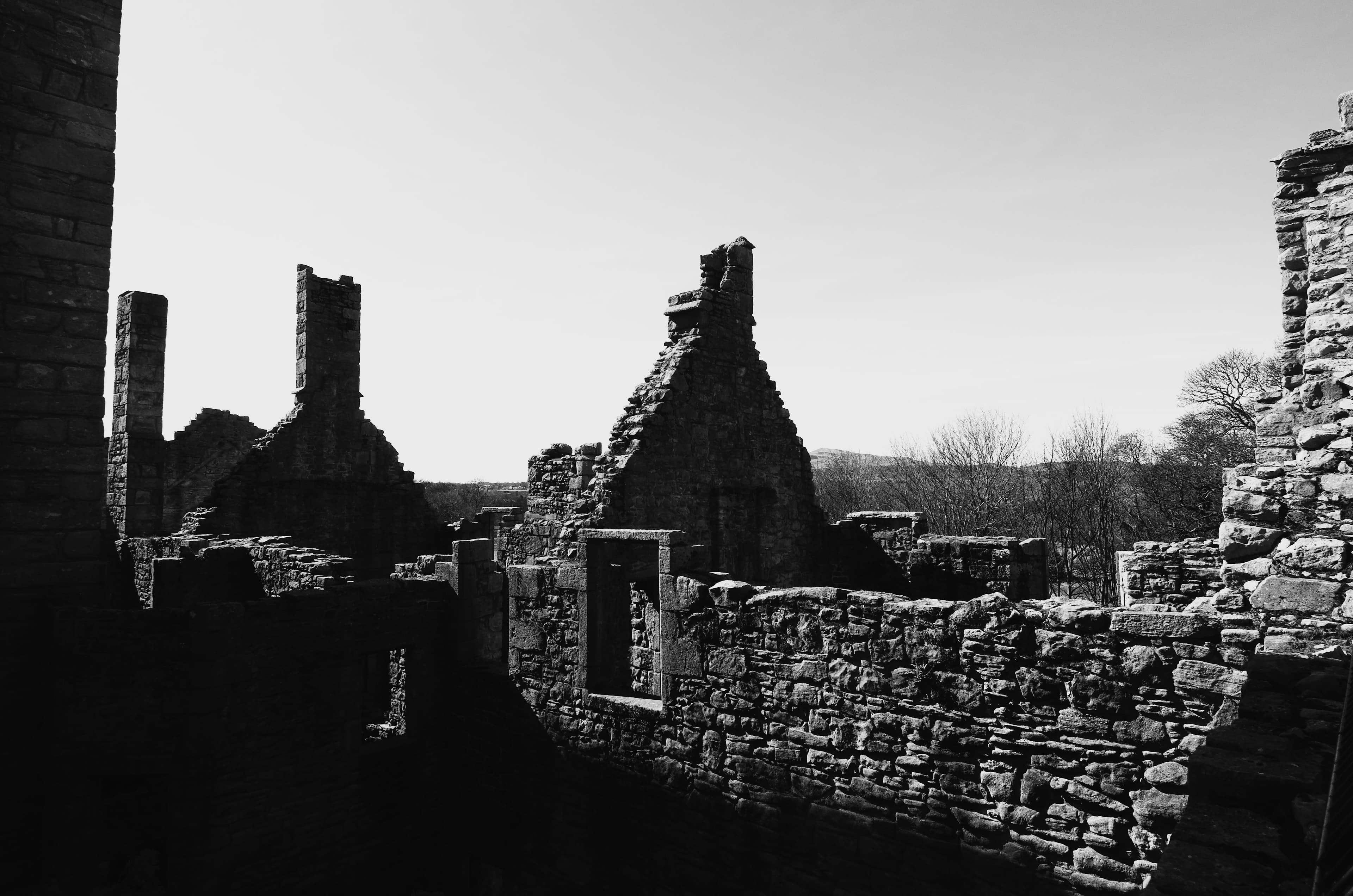 View across the stone rooftop and battlements of Craigmillar Castle