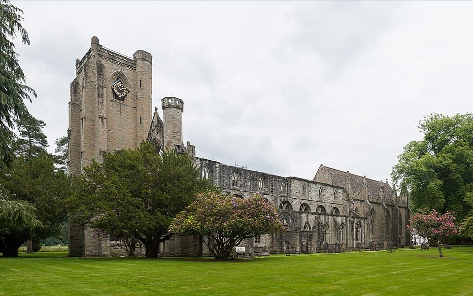 Dunkeld Cathedral ruined nave and choir beside the River Tay.