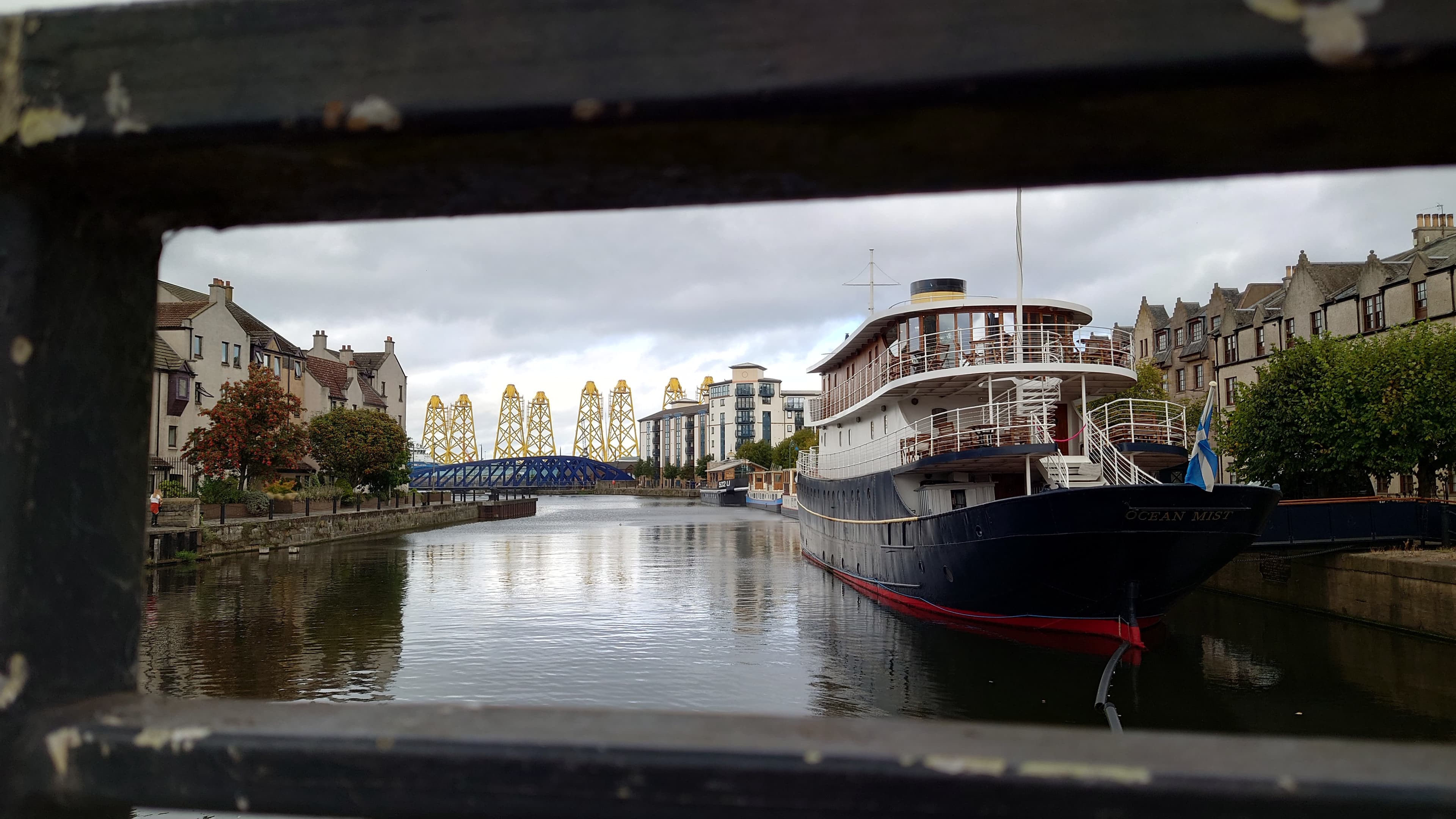 The Shore at Leith with historic waterfront buildings reflected in the Water of Leith