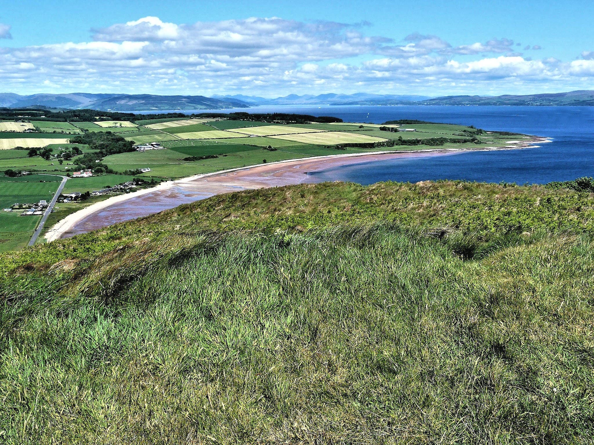 Kilchattan Bay shoreline and coastal landscape on the Isle of Bute.