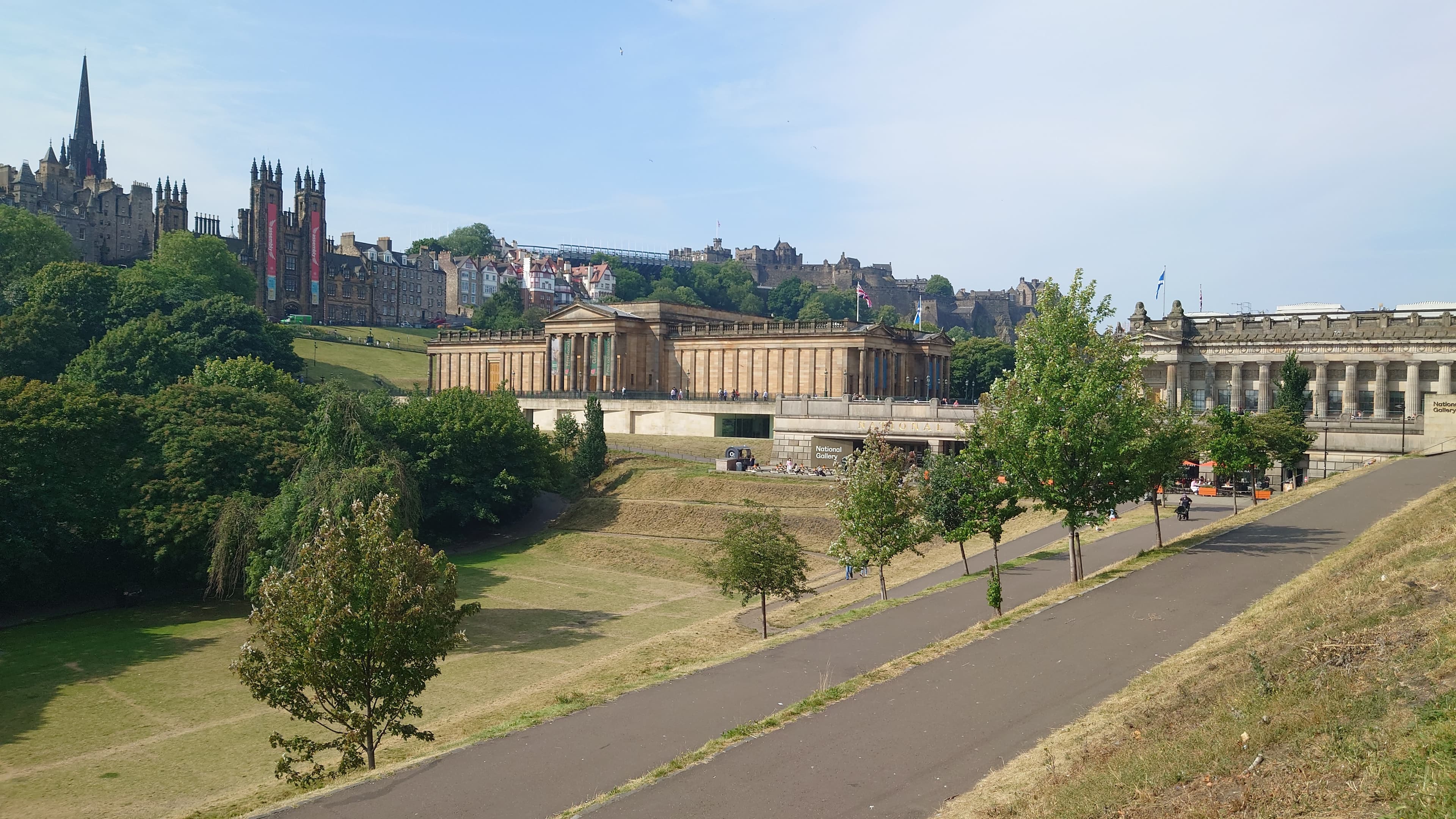 East Princes Street Gardens with the Scottish National Gallery, Edinburgh Castle and the Old Town skyline beyond.