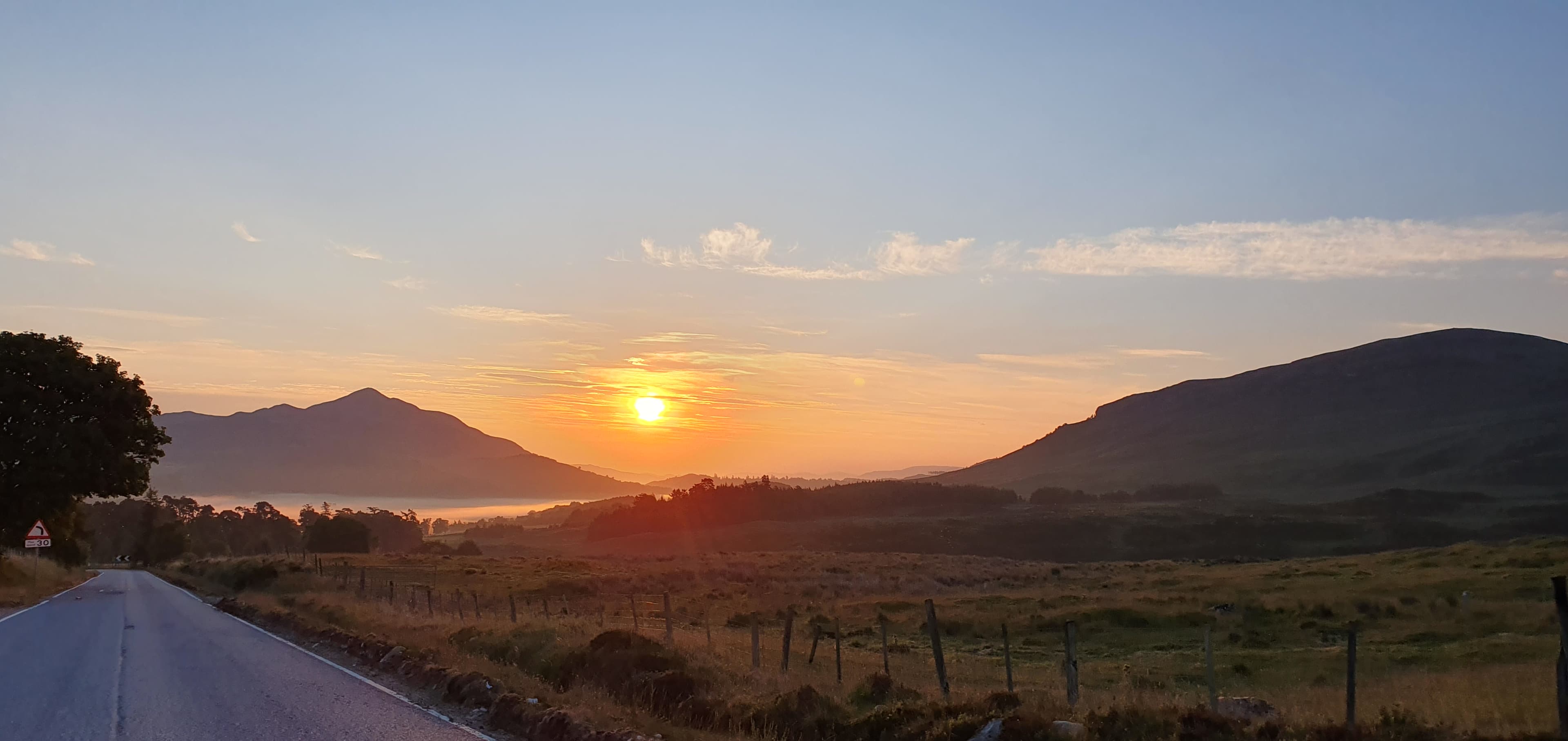 Highlands roadside early morning summer sunrise